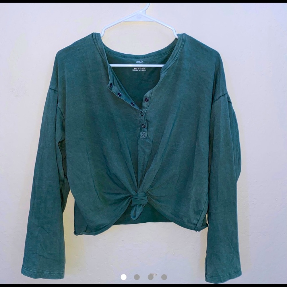 Faded green long sleeve shirt.